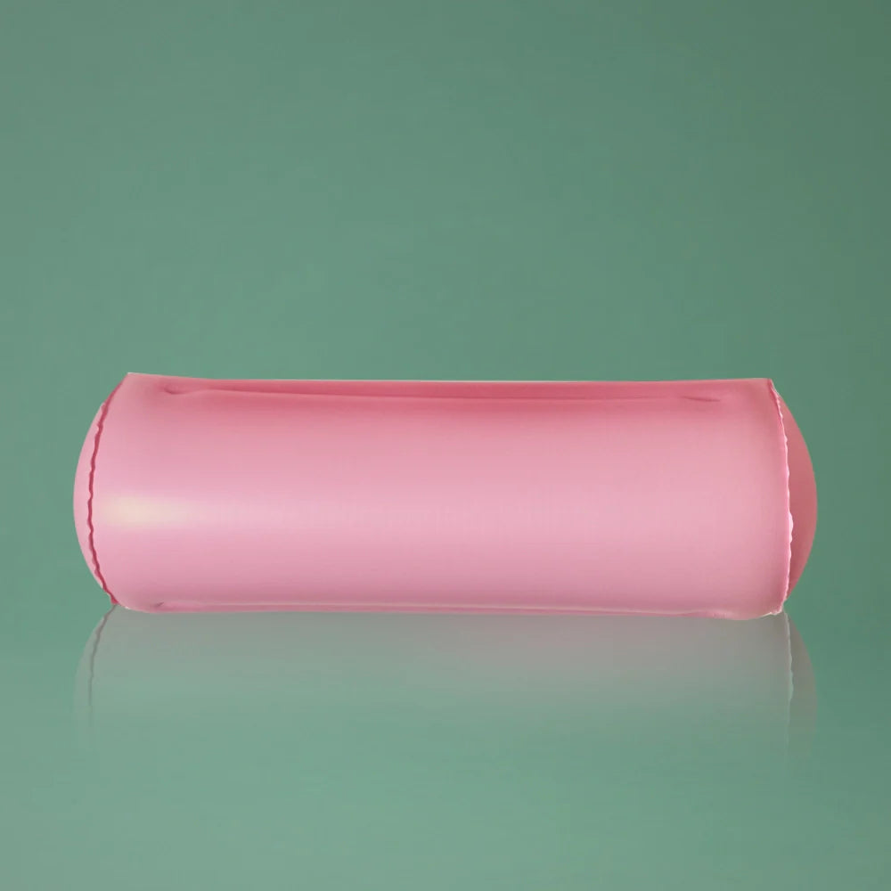 BeShapy Luxury BBL Recovery Kit Pink inflatable toilet pillow on a green background