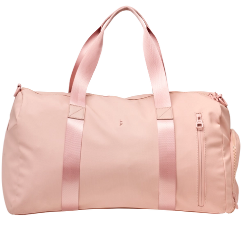 Pink duffel bag with satin straps on a white background