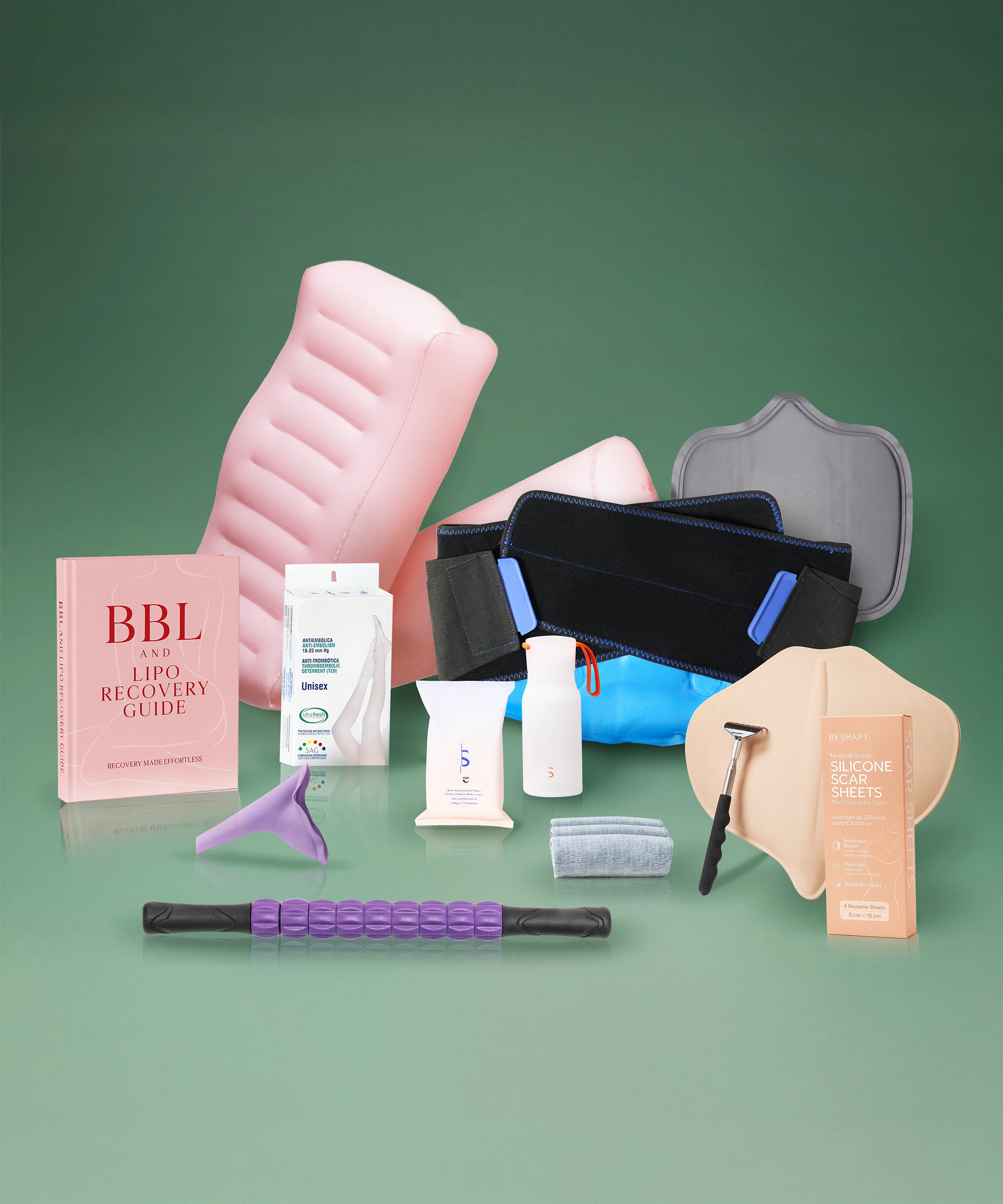 Collection of skincare and beauty products on a green background